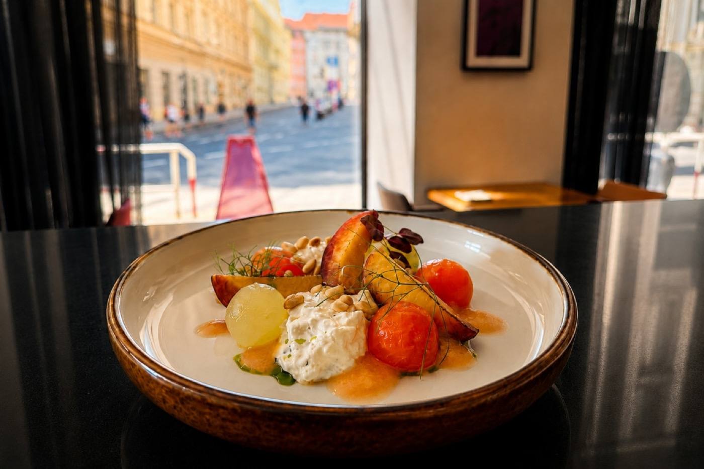 Colourful seasonal plate by the window with the street outside