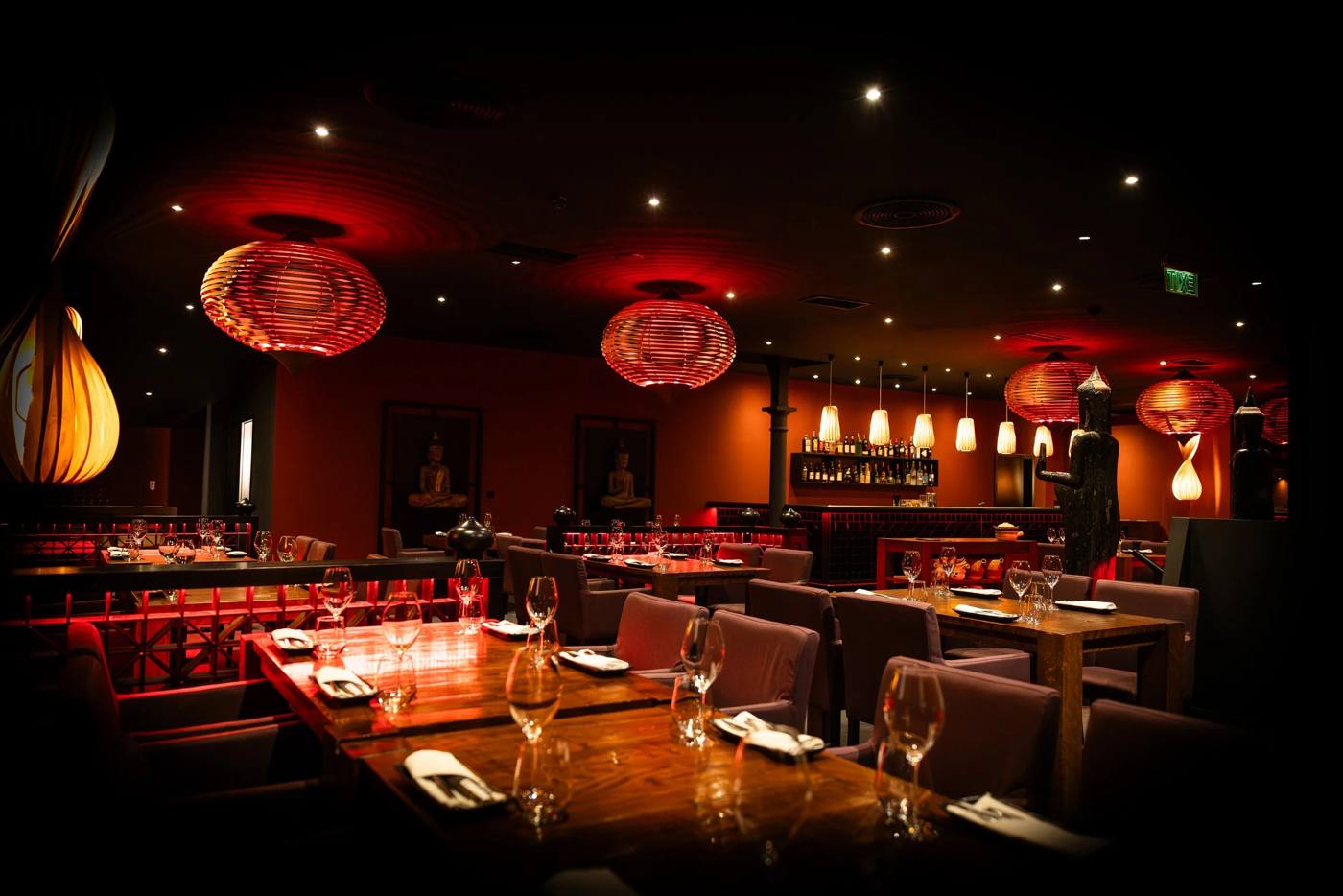 SaSaZu dining room with red lanterns and warmly lit tables