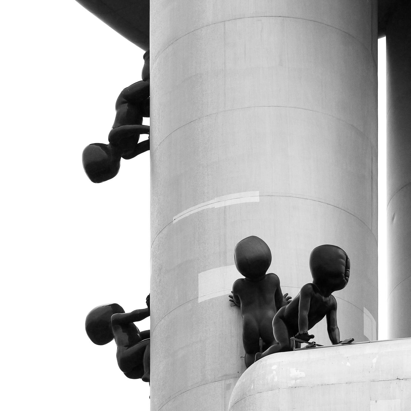 David Černý's giant faceless babies crawling up the tower's legs